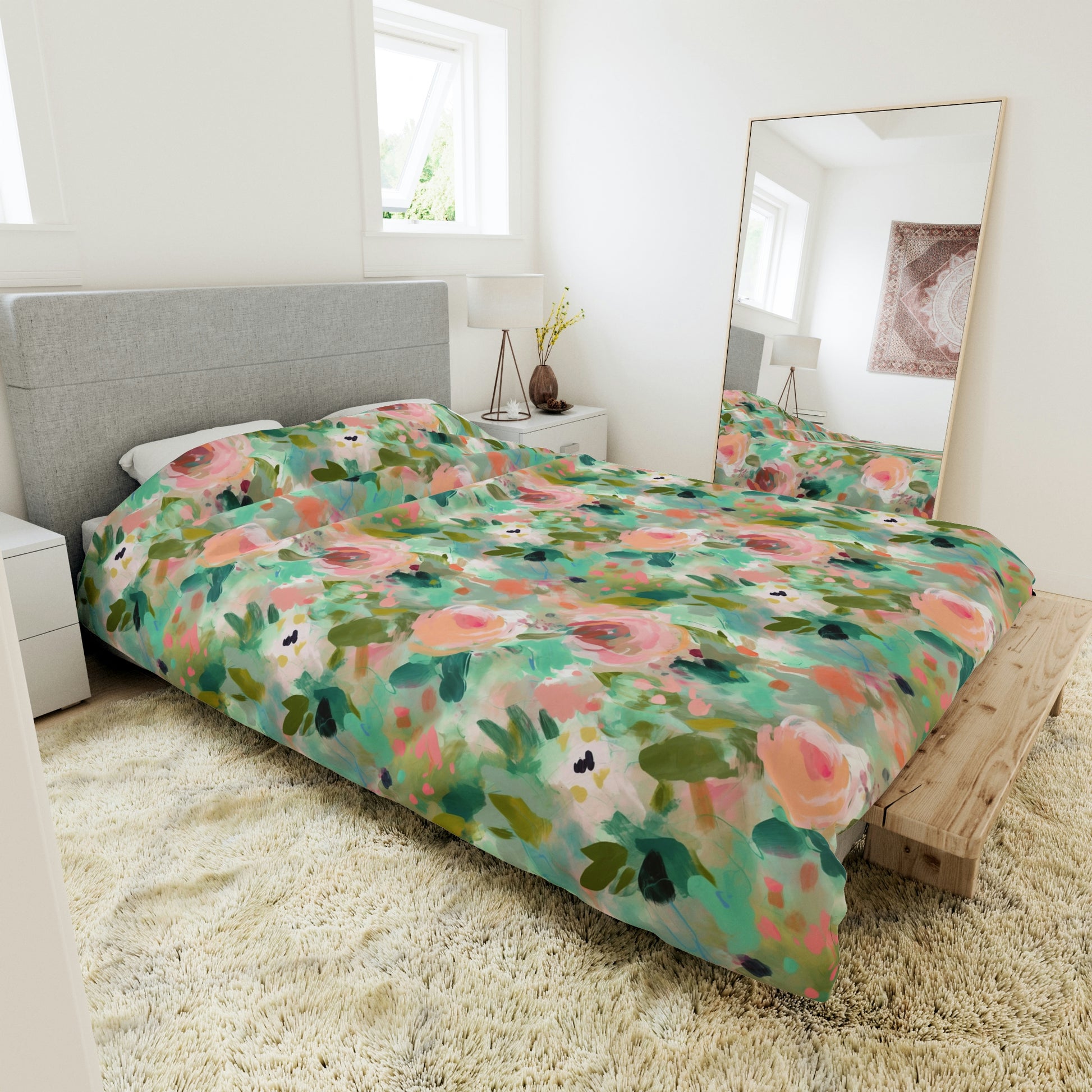 pink and green floral duvet cover on a bed, duvet cover with pink and green flowers on it, green duvet cover, pink duvet cover, green and pink abstract floral duvet cover