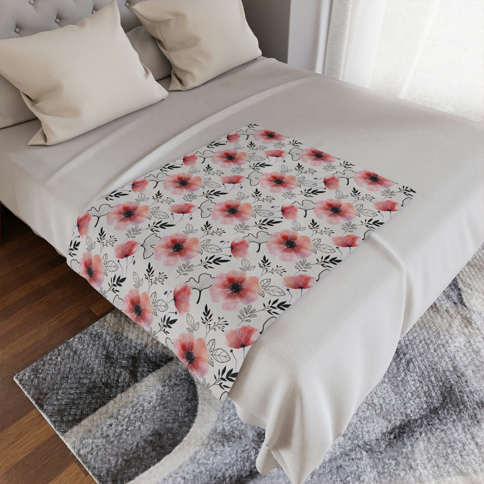 pink flowers with black outlines pattern, pink floral throw blanket lying on a bed, pink flowers on a plush blanket lying next to pillows as part of your bedroom decor