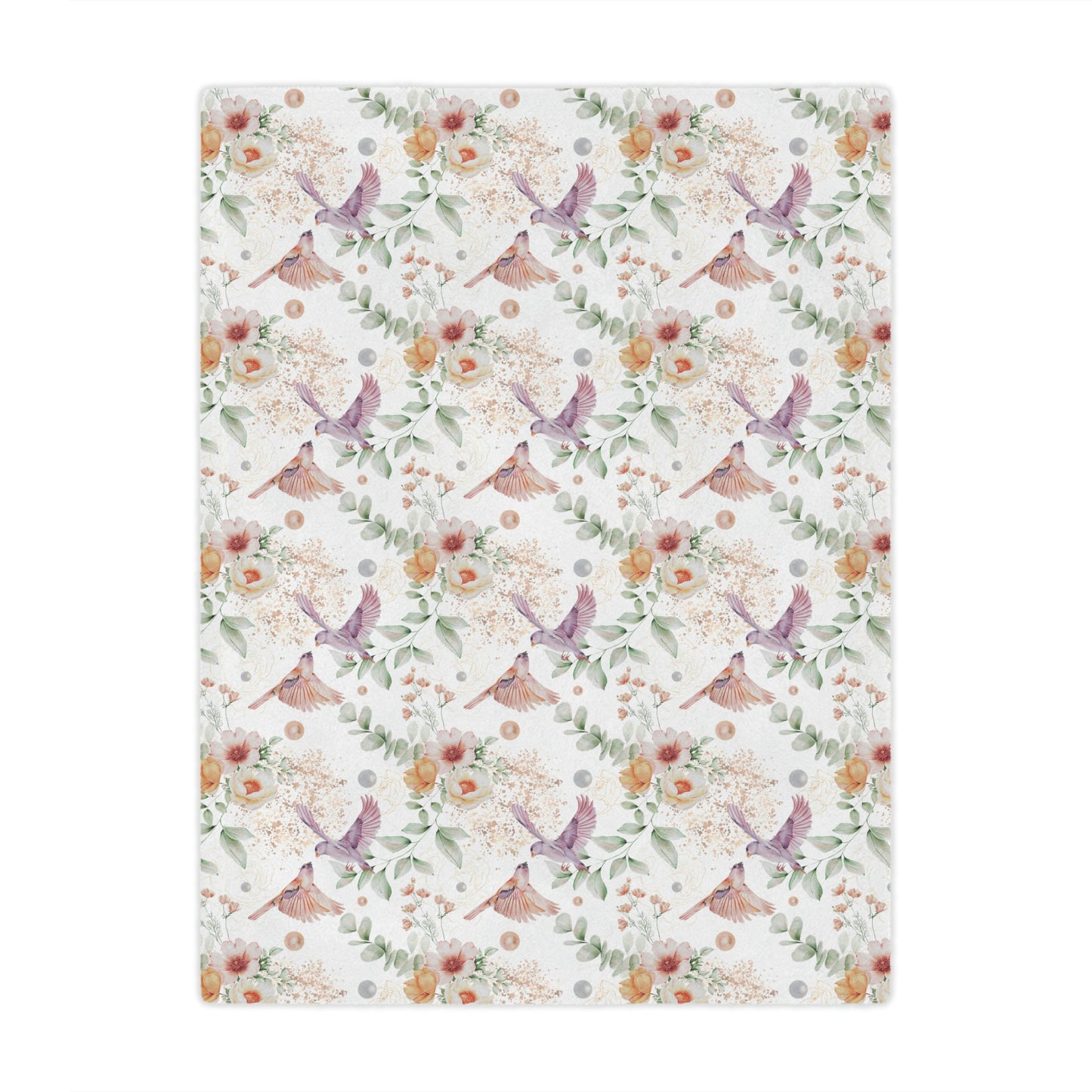 floral blanket with birds lying on a bed, floral throw blanket decorating a bed or couch, floral accent blanket
