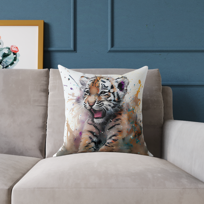 tiger pillow with a beautiful watercolor design to accent your couch or chair, throw pillow with a cute tiger cub design, tiger pillow sitting on a couch in a living room