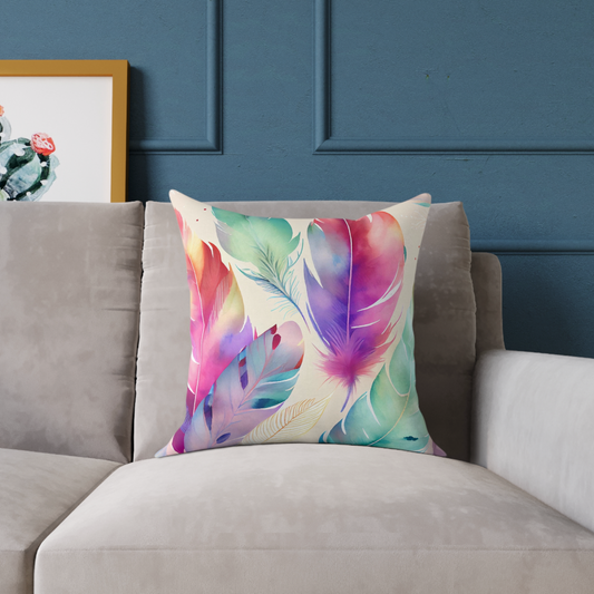 feather design accent throw pillow sitting on a couch or chair, watercolor feather pattern throw pillow the perfect accent for your home decor