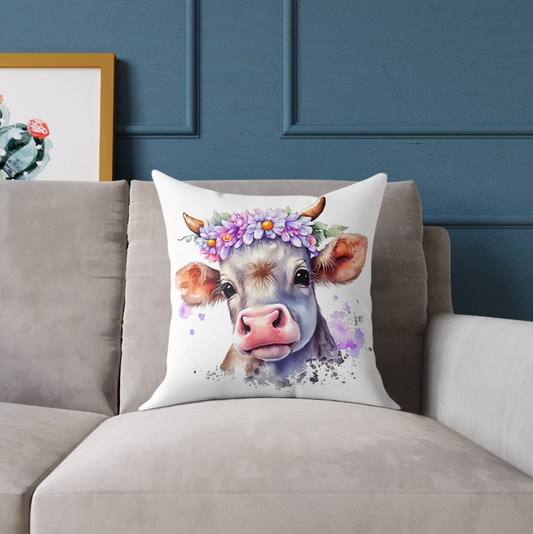 floral cow pattern accent throw pillow, cow pillow sitting on a living room couch, square cow theme throw pillow for your cow theme room decor