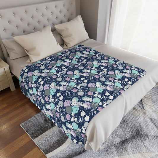 blue and purple floral plush throw blanket lying on a bed, decorate your living room couch or chair with a floral throw blanket, cozy blue blanket decoration