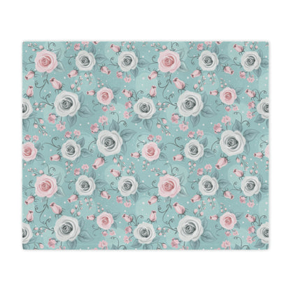 light blue plush throw blanket with pink roses and blue roses lying on a bed decorate your home bedroom with a blue blanket with pink roses one it